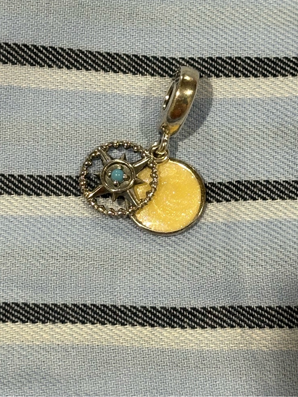 Pandora Silver Compass and mother of pearl charm.